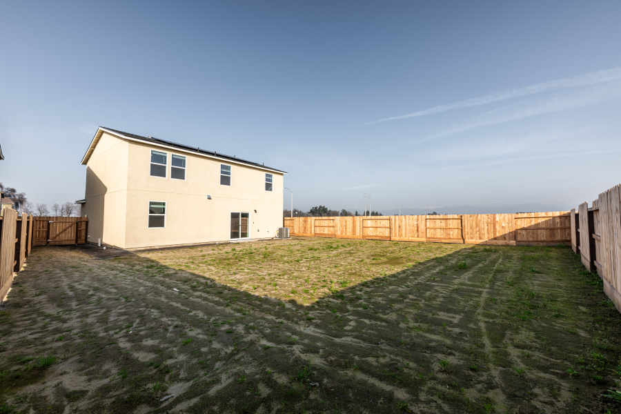 A house with a fence around it.