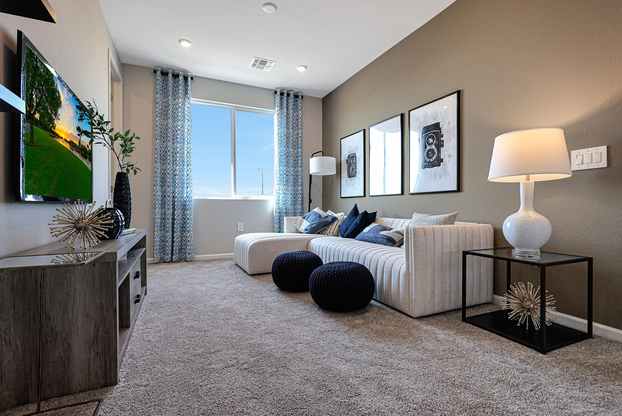 A living room with a tv and couches.