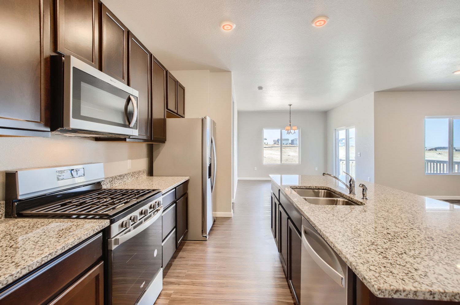 A kitchen with stainless steel appliances.