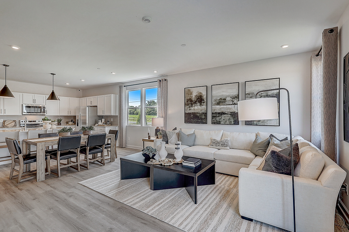 A living room with a large window.