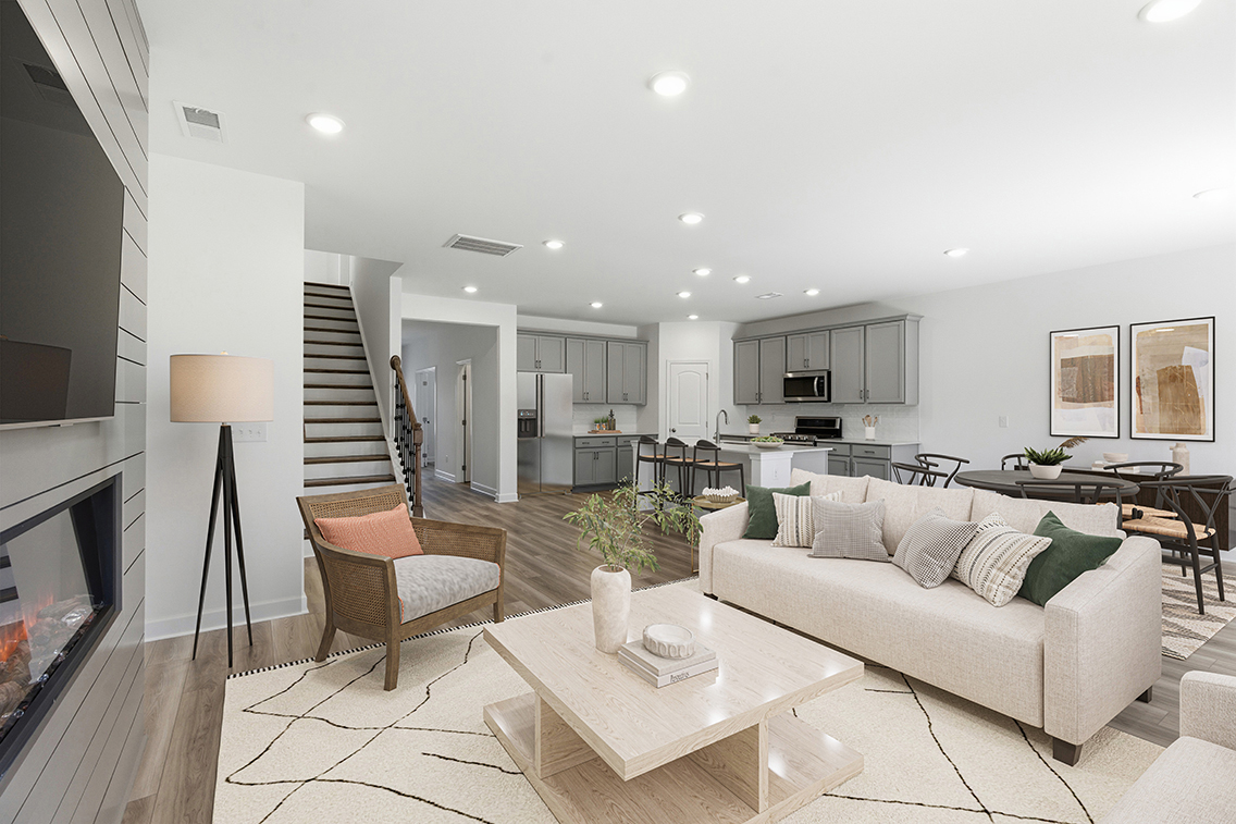 A living room with a couch and a coffee table.