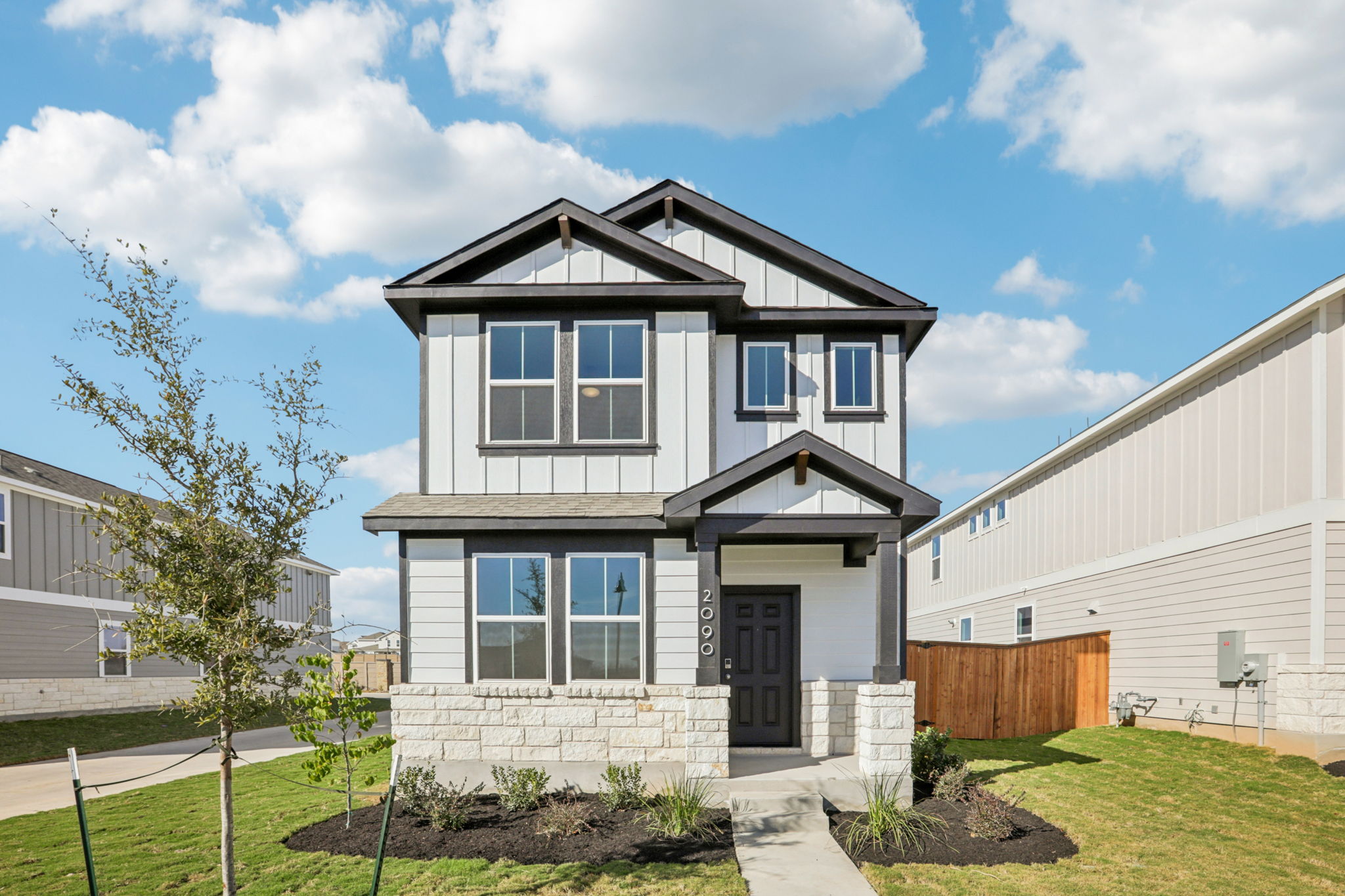 A house with a fence around it.