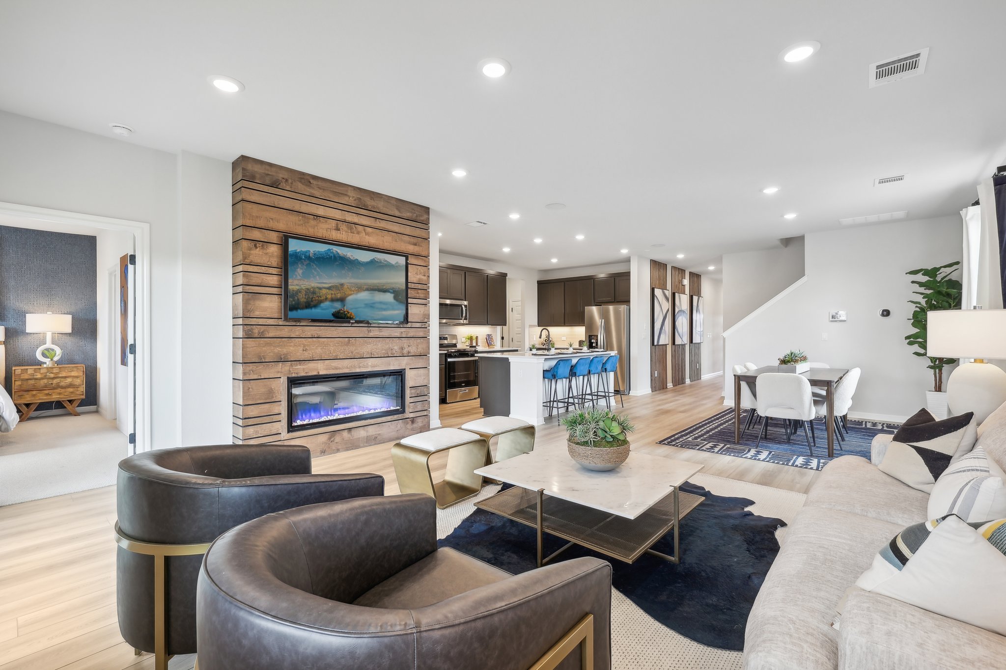 A living room with a fireplace.