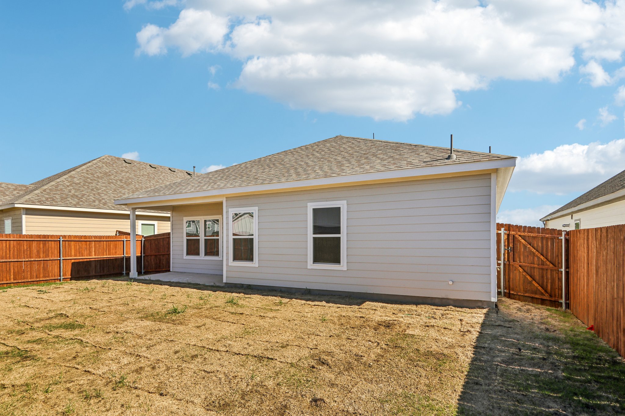 A house with a fence around it.