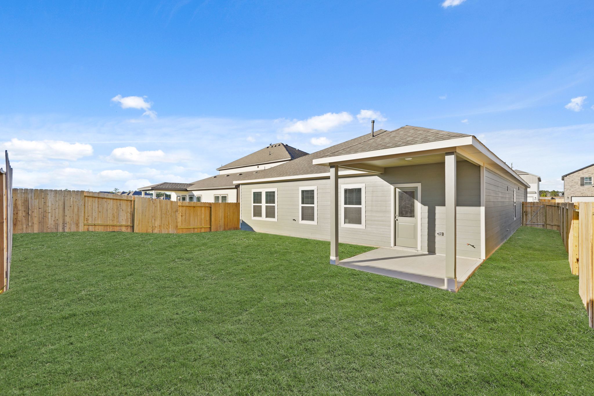 A house with a fence around it.