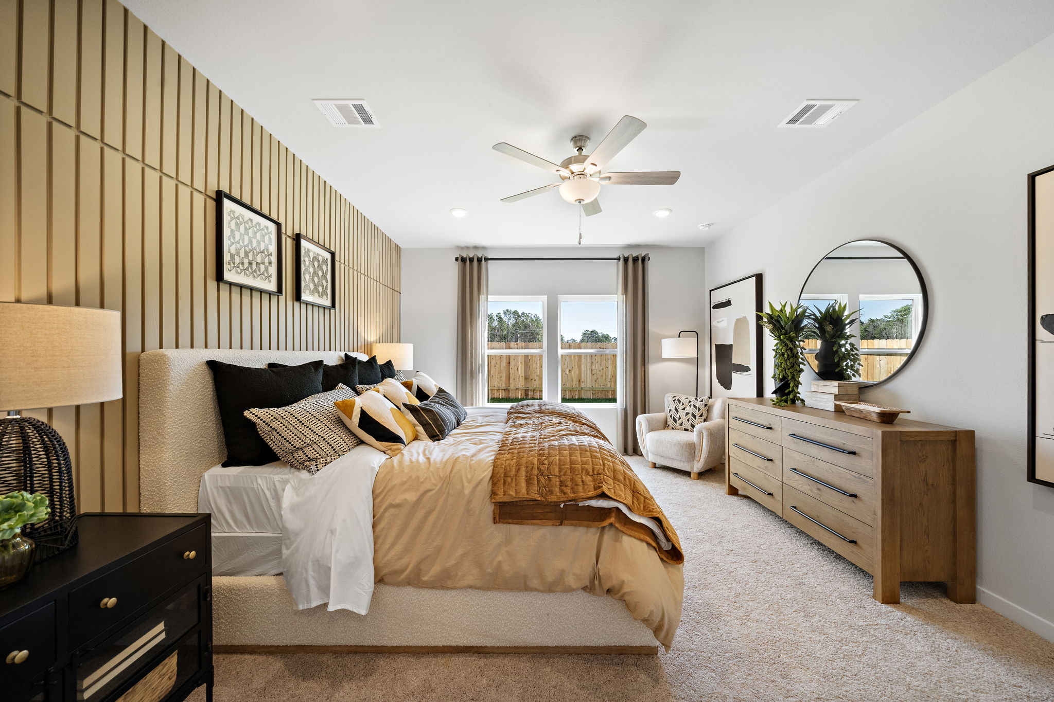 A bedroom with a large bed.