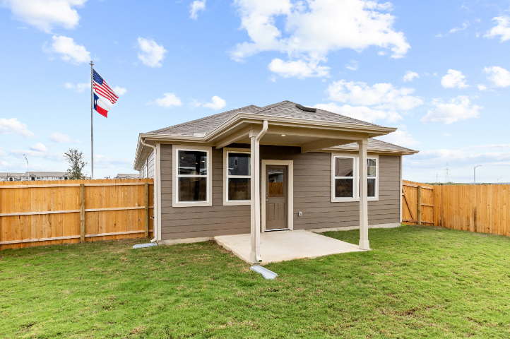 A small house with a flag on the roof.