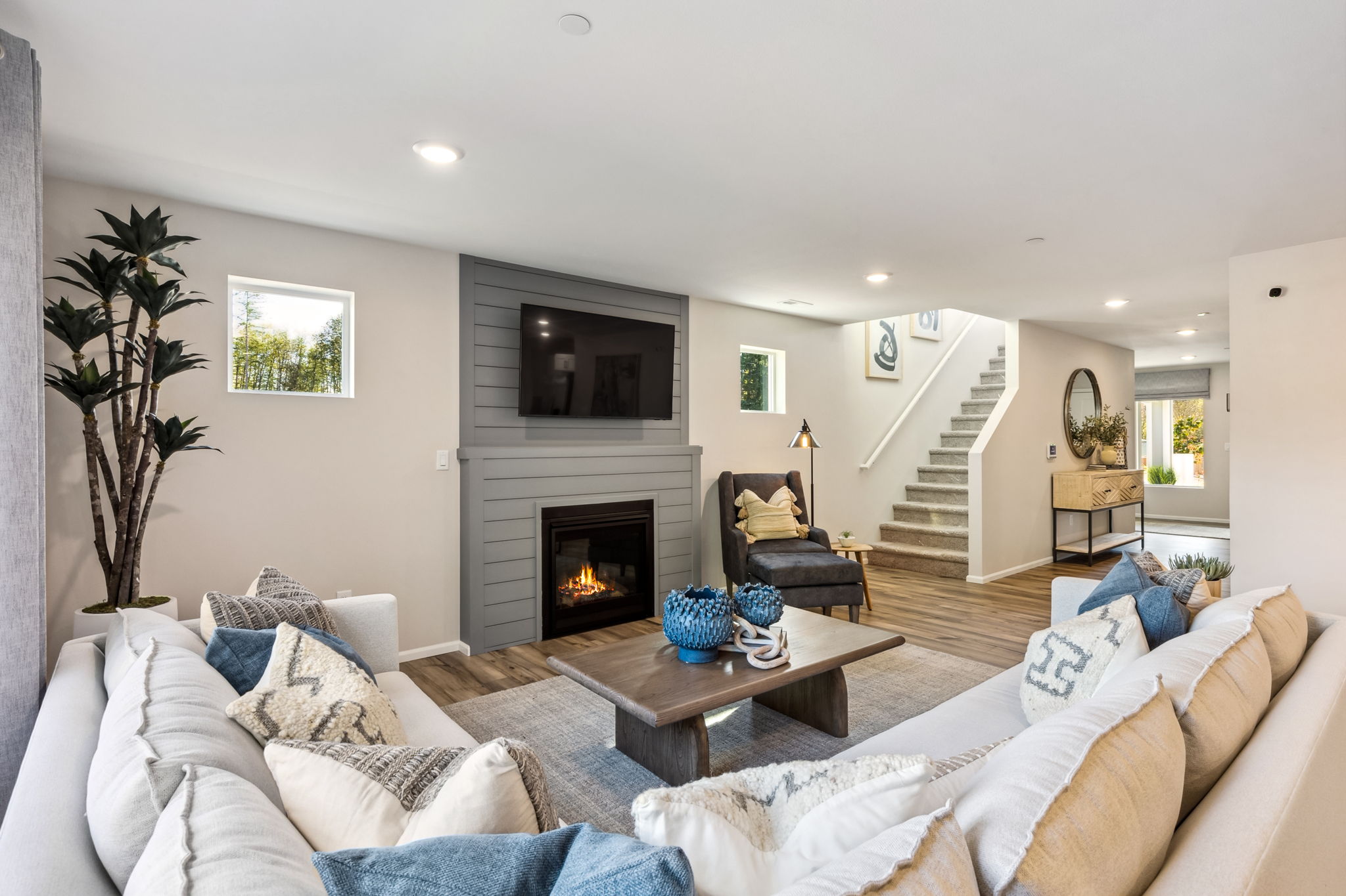 A living room with a fireplace.