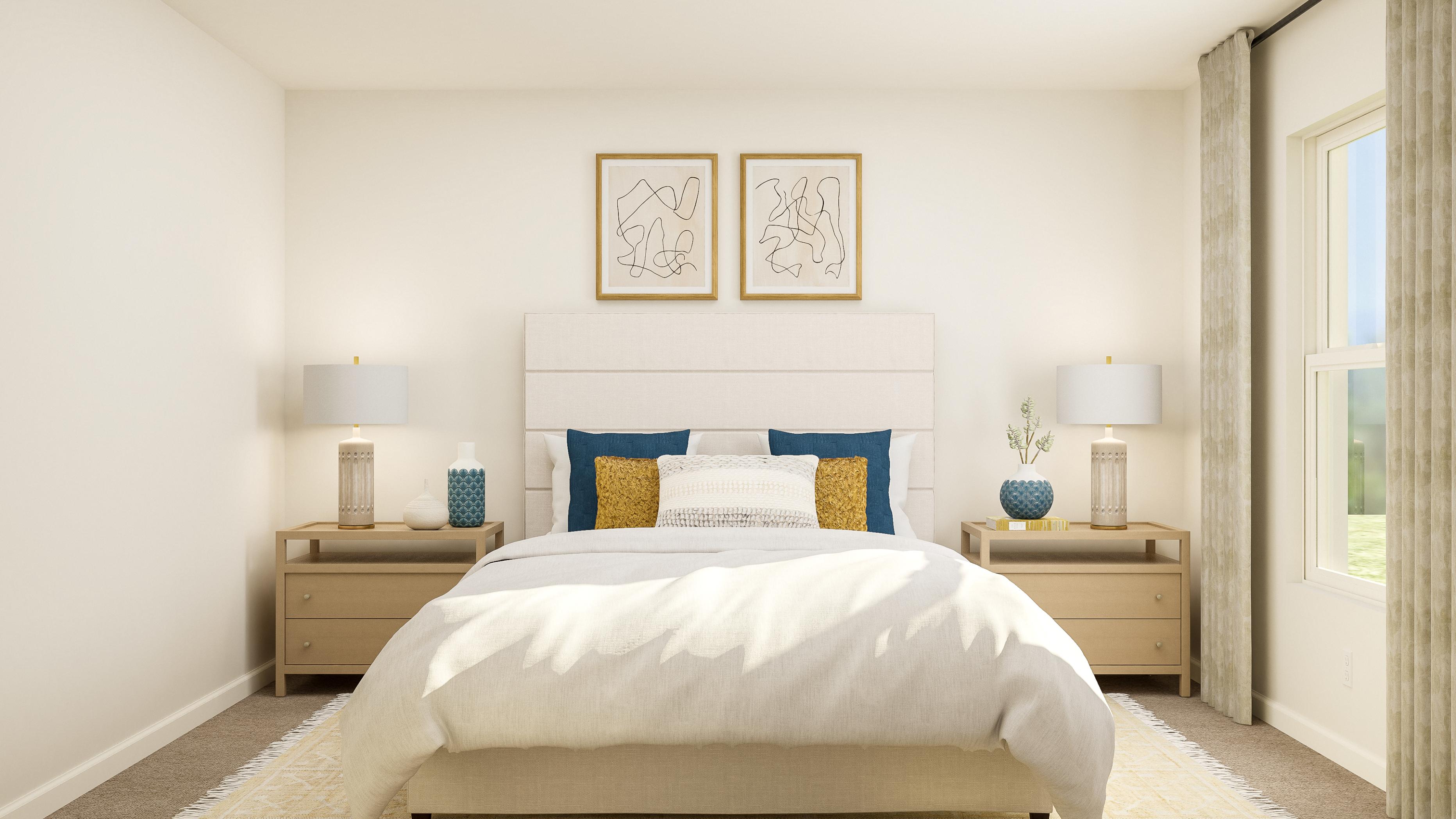 A bedroom with a bed and lamps.