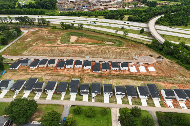 A parking lot with many cars.